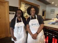 
                  Black Hibachi chefs smiling