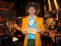 
                  Mad Hatter holding custom cutting board and chopsticks