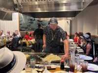 
                  Chef cooking hibachi at Kabuki